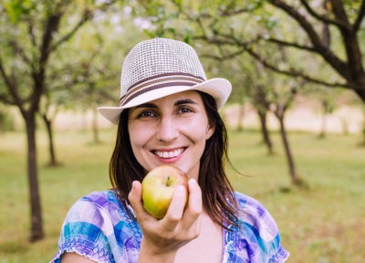 Woman holding an apple