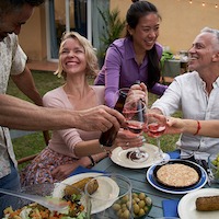 family gathered around dinner table